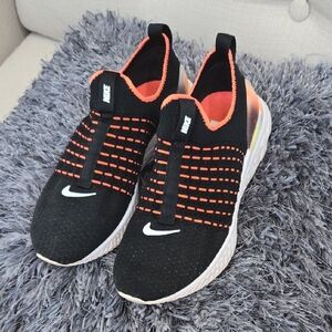 Nike Womens 8.5 Black and Orange Slip-On Sneakers